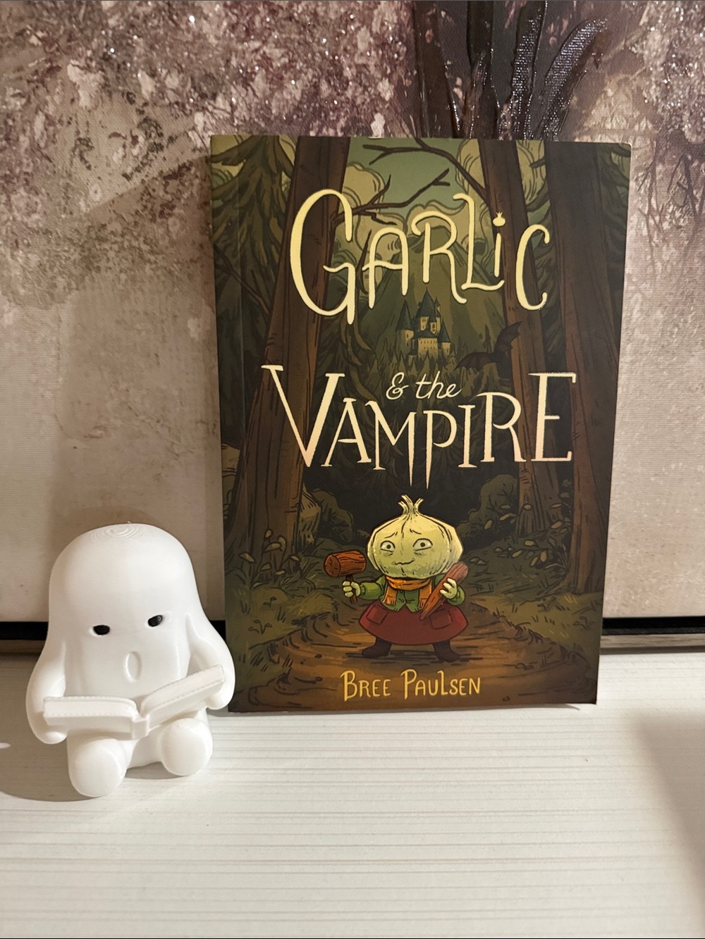 Halloween bundle for kids. Plastic ghost and garlic and the vampire book.